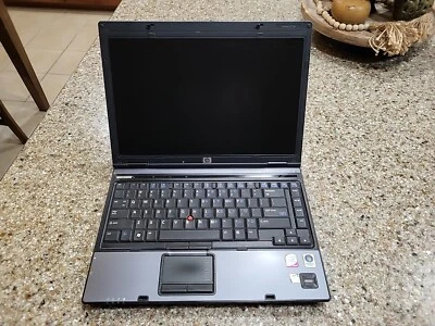HP Compaq 6910p, Intel Core 2 Duo T7100 1.8Ghz, 1GB RAM, Sin PIEZAS DE DISCO DURO Foto 1 de 4