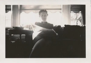 Snapshot Vintage Photo Beautiful Lighting Young Woman Reading Newspaper 1939 - Picture 1 of 5