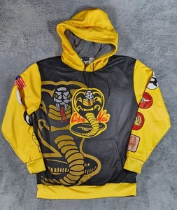 Sudadera con Capucha Pullover Cobra Kai Para Hombre Talla Grande Negro Amarillo Estampado 3D No Mercy - Imagen 1 de 7