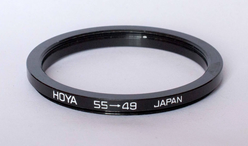 Hoya 55-49mm step down ring. - Image 1 of 1
