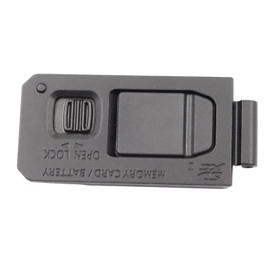 Piezas de reparación para Panasonic Lumix DMC-LX100 batería puerta tapa unidad negro nuevo Foto 1 de 3