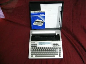 Sharp PA-1000H Portable Intelliwriter Electric Typewriter Tested types READ ALL - Picture 1 of 14