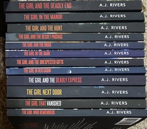 A.J. Rivers Emma Griffin Mystery Series Lot of 12 “The Girl” Softcover Books Set - Foto 1 di 15