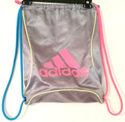 Adidas gym bag gray 18 in by 12 in, silver bag, pink and blue arm straps - Image 1 of 4
