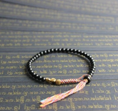 Pulsera hecha a mano budista tibetana parejas nudos de la suerte a juego mujeres hombres Foto 1 de 4