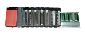 MITSUBISHI MELSEC-Q PLC Q61P, Q02HCPU, Q173PX, QX82-S1, QY81P, QY80, Q64AD, Q312B - Imagen 1 de 7