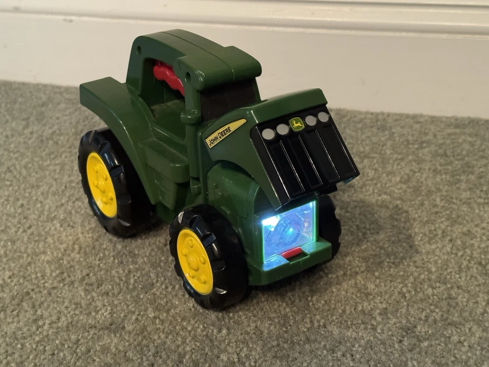 John Deere ~ Roll N Go Flashlight Tractor ~ With Light, Sound, & Pop-Up Hood - Image 1 of 4