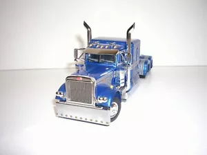 DCP FIRST GEAR 1/64 BLUE AND GRAY PETERBILT 379 WITH 63" SLEEPER - Picture 1 of 5