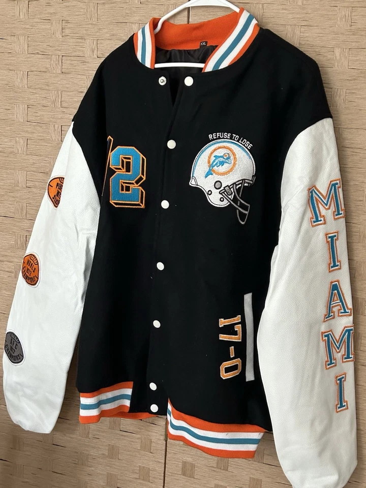 Chaqueta universitaria invicta de los Miami Dolphins 1972 mangas de cuero sintético y cuerpo de lana Foto 1 de 2