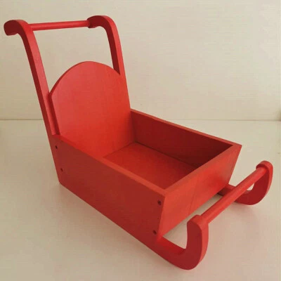 Estudio fotográfico recién nacido sesión fotografía utilería bebé niños telón de fondo madera trineo rojo  Foto 1 de 4