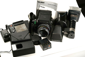 Rollei Rolleiflex 6008, Planar 2,8/80, Prismensucher, 2x Filmhalter, Metz Blitz