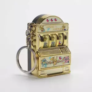 Divertido llavero mini máquina tragamonedas con figuras estilo Pokemon, ideal para niños. - Imagen 1 de 4