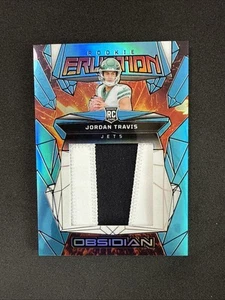 Parche azul de materiales de erupción de novato Panini Obsidian Jordan Travis RC 2024/25 - Imagen 1 de 3