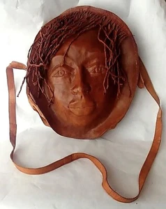 Bolso bandolera tribal vintage hecho a mano en 3D moldeado rostro humano cuero genuino - Imagen 1 de 8