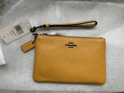 *NUEVO CON ETIQUETAS* Muñequera pequeña Coach 22952 de cuero granulado en panal de miel Foto 1 de 4