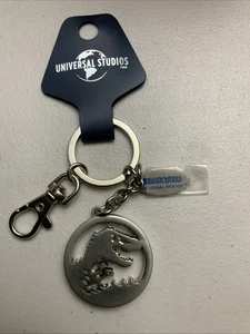 Universal Studios Jurassic Park T-Rex Keyring Keychain Bag Charm Silver Tone NWT - Picture 1 of 4