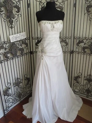 VESTIDO DE NOVIA FORMAL CON CUENTAS P 121 CAJA ESTRELLA TALLA 0-2 O XS MARFIL $499 Foto 1 de 4