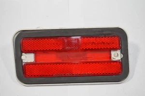 1970-1981 PONTIAC FIREBIRD LH RED REAR SIDE MARKER LIGHT LENS & HOUSING 5963135 - Picture 1 of 8