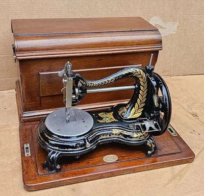 Antique Jones Serpentine, Swan Neck or Cat Back Sewing Machine with case - image 1 of 4
