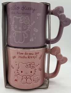 Hello Kitty 2 pièces. Tasses 50ème anniversaire rose et violet - Photo 1/10