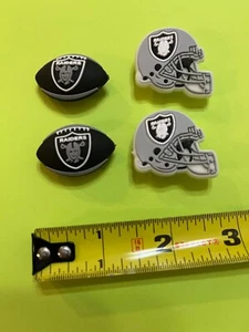 Lot of 4 Las Vegas Raiders Shoe Charms Button Back 2 Helmets & 2 Footballs - Picture 1 of 4