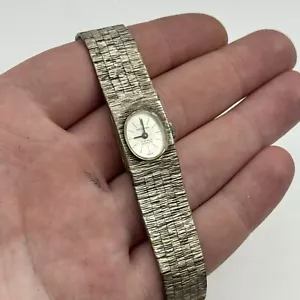 Reloj suizo de cuerda manual vintage Delvina tono plata 15 mm para dama NO FUNCIONA - Imagen 1 de 15