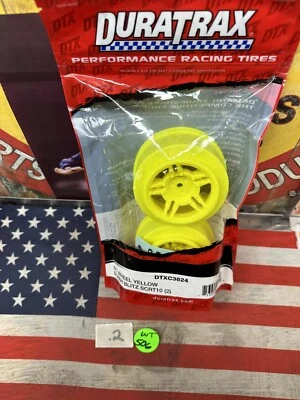 DURATRAX DTXC3824 SC WHEEL YELLOW for: SLASH, BLITZ, SCRT10 2pc. - Image 1 of 4