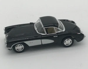 KINSMART 1957 Chevrolet Corvette Jet Black & White 1/34 Scale Diecast Car - Picture 1 of 12