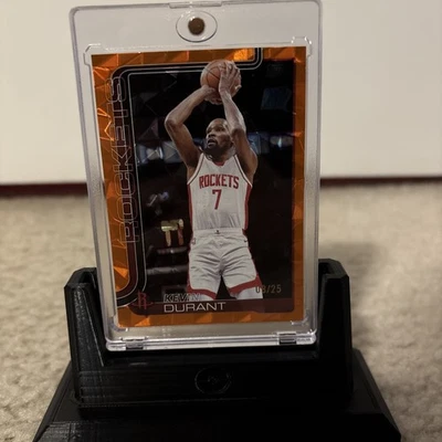 Tarjeta #157 Rockets 2025-26 Kevin Durant Topps naranja paralelo #16/25 Foto 1 de 3