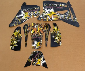 2001 - 2004 KIT DE PEGATINAS GRÁFICAS SUZUKI RM 85 RM85 rockstar : calcomanía negra / dorada - Imagen 1 de 1