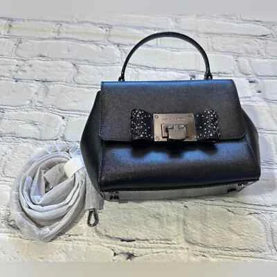 Cartera de cuero Michael Kors Tina Bow Jewel en negro Foto 1 de 4