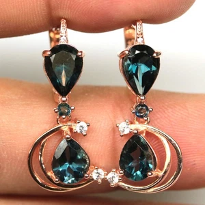 925 Sterling Silver 6 x 9 mm. London Blue Topaz & Zircon Earrings Rose Gold - Picture 1 of 4