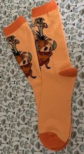 Neu Acuna Matata Socken Größe 7-9 Disney neu ohne Etikett orange leuchtende Farbe - Bild 1 von 6