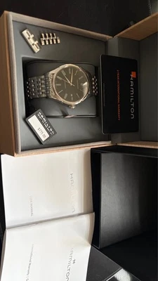 Reloj Hamilton American Classic para hombre negro con correa plateada de acero inoxidable... Foto 1 de 4