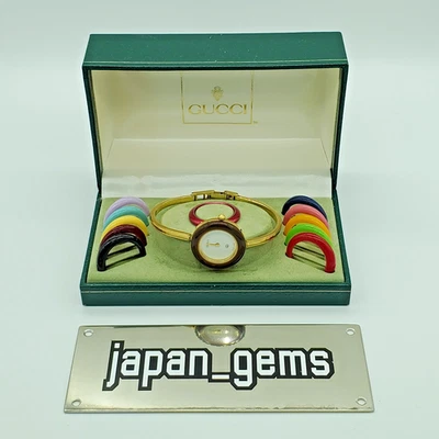 Relógio feminino Gucci moldura de mudança 12 cores branco/dourado NÃO FUNCIONA S240417B - Imagem 1 de 4
