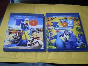 (2) Rio Blu-Ray/DVD Lot: Rio 1 & 2 Both Movies Anne Hathaway Jesse Eisenberg - Picture 1 of 1