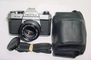 Pentax K1000 35mm Film SLR Manual Camera + Pentax-M 50/1.4 smc Lens - Near Mint - Picture 1 of 6
