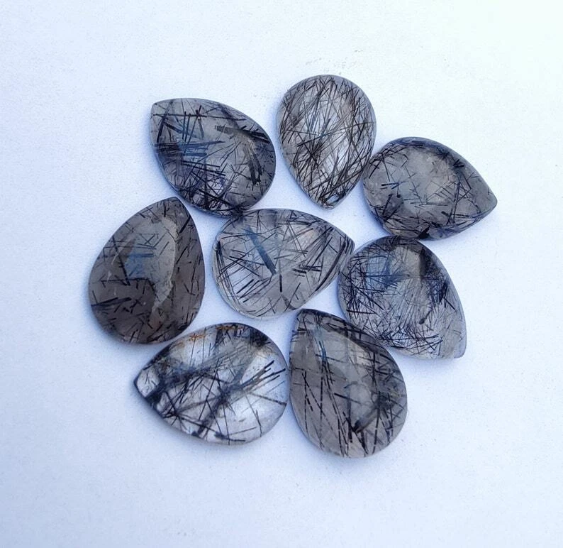 AAA Quality Natural Black Rutile Quartz Pear Shape Cabochon Loose Gemstone - Image 1 of 4
