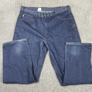 Pantalones de mezclilla Carhartt FR resistentes al fuego para hombre 38x30 (Act. Denim azul 37x30) FRB150 PRW - Imagen 1 de 12