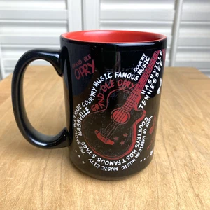 Taza de café de recuerdo Grand Ole Opry Nashville Tennessee negra roja blanca 18 OZ - Imagen 1 de 7