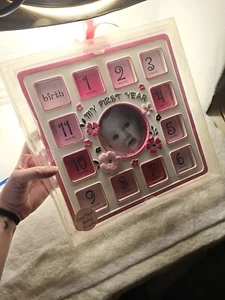 Baby Essentials MY 1ST YEAR Baby Girl Photo Frame Collage Holds 13 Pics NIB.! - Picture 1 of 6