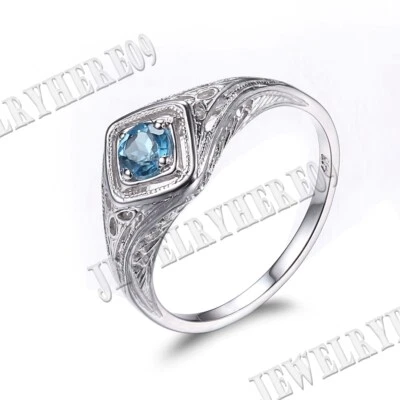 Anillo de compromiso de boda de topacio azul suizo único de plata esterlina de colección Foto 1 de 4