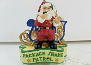 House Of Lloyd "Package Shake Patrol" Weihnachtsschmuck Bewegungsaktiviert 1999 - Bild 1 von 6