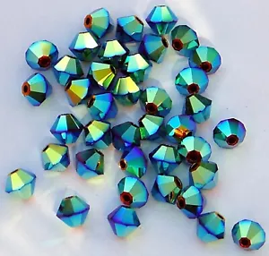 25 pcs Genuine SWAROVSKI 6mm Bicone 5301/5328 CRYSTAL MERIDIAN BLUE AB - Picture 1 of 1