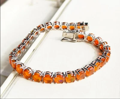 Brazalete de tenis redondo de ópalo de fuego de 4 mm de oro amarillo sobre plata de ley de 6,5 pulgadas Foto 1 de 4