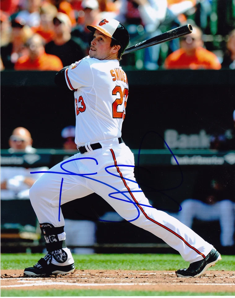 TRAVIS SNIDER  BALTIMORE ORIOLES   ACTION SIGNED 8x10 - Image 1 of 1