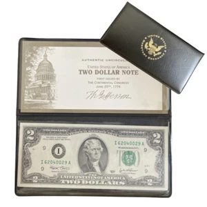 Estuche carpeta de intercambio monetario mundial de dos dólares 2003-a $2 nítido como nuevo en caja con certificado de autenticidad - Imagen 1 de 3