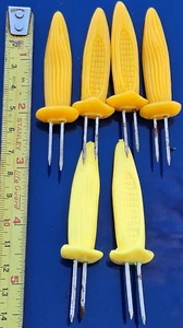 Vtg Corn on the Cob Holders 3.4" Skewers Set Of 6 Yellow Plastic Stainless Tines - Picture 1 of 2