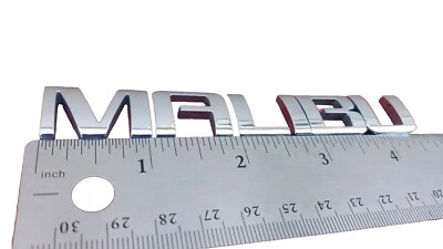 Chevrolet Malibu 2008-2012 cubierta trasera tapa maletero emblema 22842005 usado OEM Foto 1 de 4