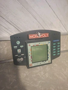Vintage Monopoly Electronic Handheld LCD Board Game 1997 Hasbro Battery Operated - Picture 1 of 2